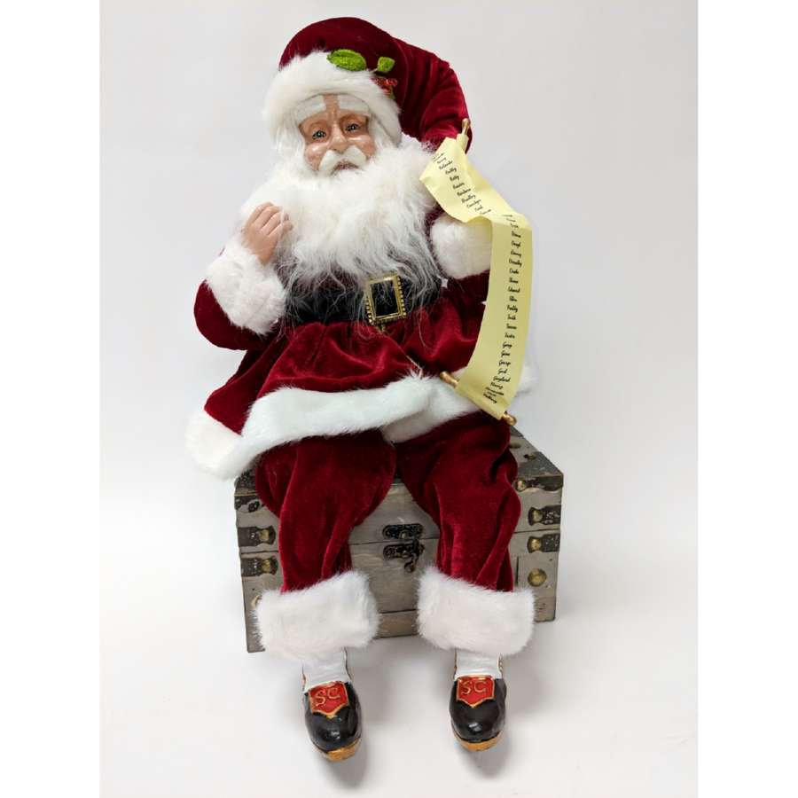 A fabolous decoration to buy in UK - K&K Interiors 51411A - Sitting Red Velvet Santa with List