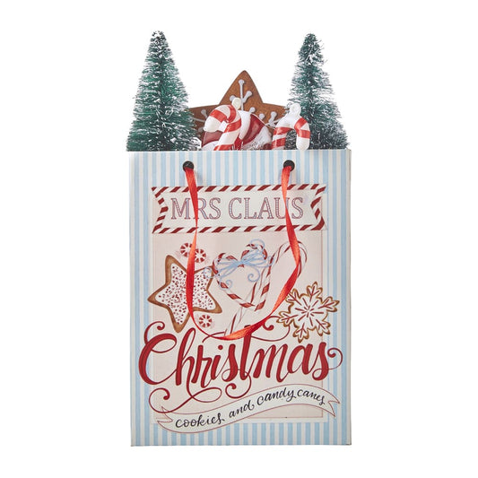 A fabolous decoration to buy in UK - Raz Imports 7.75inch Mrs Claus Christmas Shopping Bag Ornament 4119022